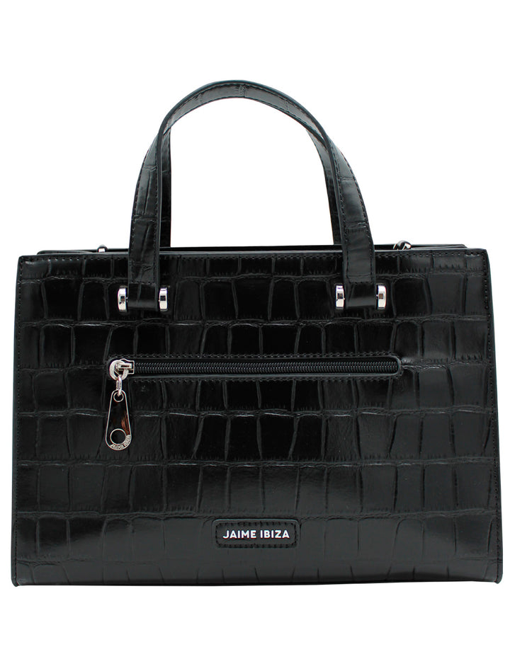 Bolso negro de Jaime Ibiza con textura de piel de cocodrilo, asas superiores y detalles en metal plateado.