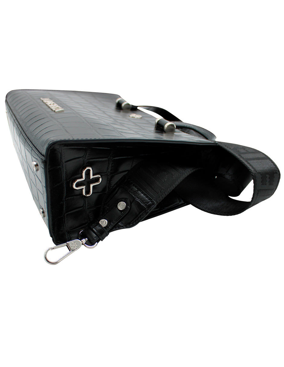 Bolso negro de Jaime Ibiza con textura de piel de cocodrilo, asas superiores y detalles en metal plateado.