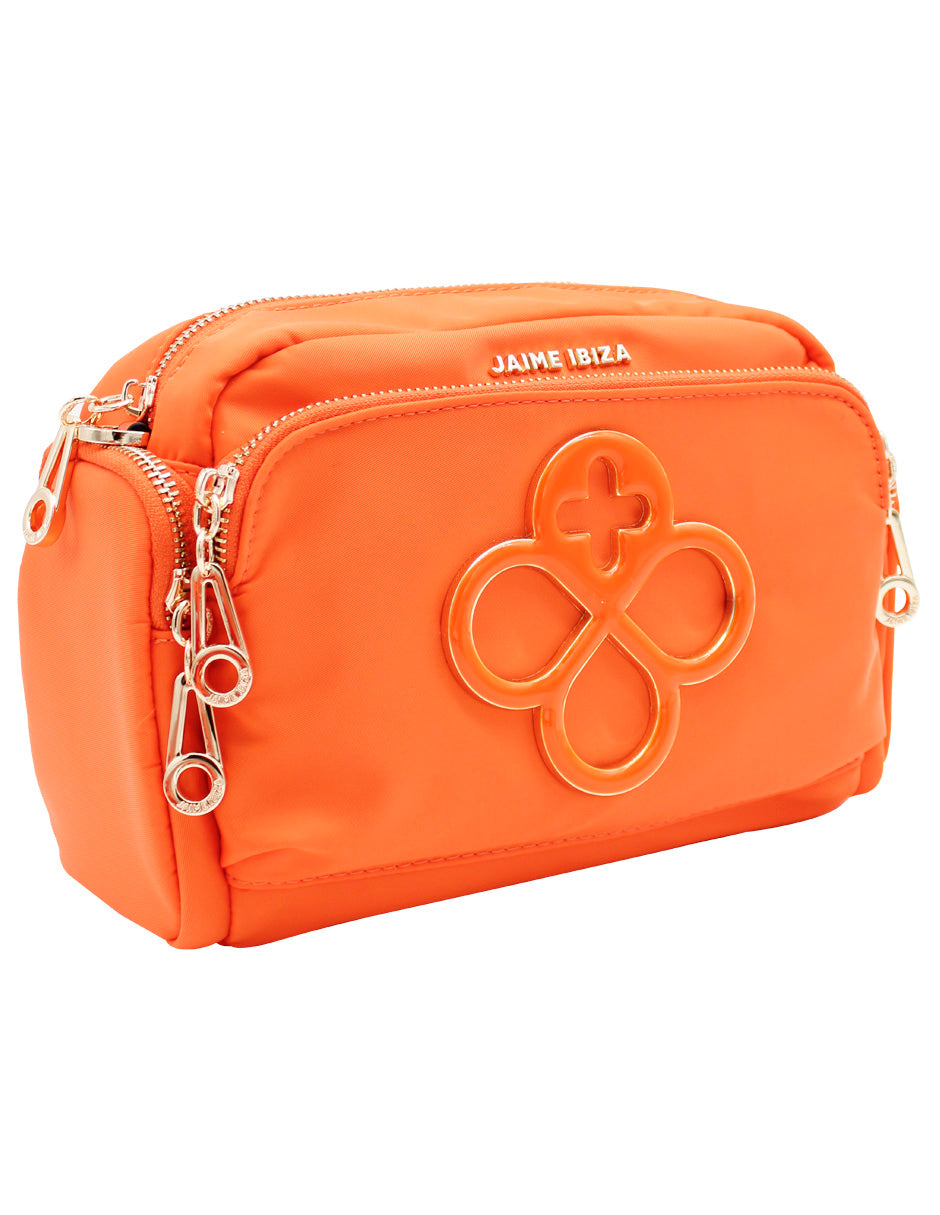 Bolso neceser color naranja de Jaime Ibiza con detalles plateados y logo en relieve.