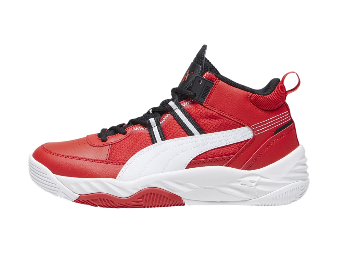 Tenis PUMA Rebound Future Nextgen en color rojo con detalles en blanco y negro, diseñados para baloncesto.