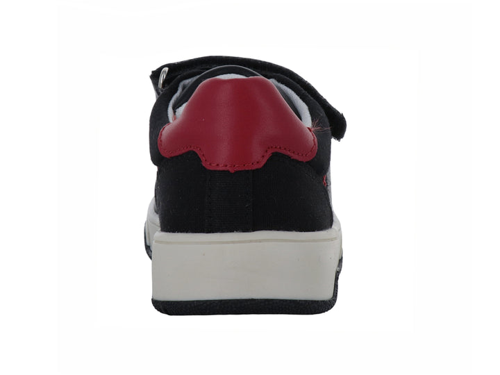 Zapato infantil marca Elefante en color negro con detalles blancos y rojos, cierre de velcro y agujetas.