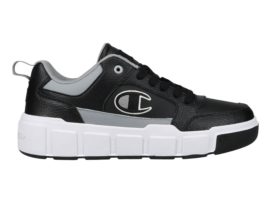 Tenis Champion Drome Ventor Lo color negro con detalles en gris y suela blanca gruesa.