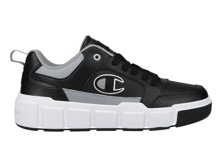 Tenis Champion Drome Ventor Lo color negro con detalles en gris y suela blanca gruesa.