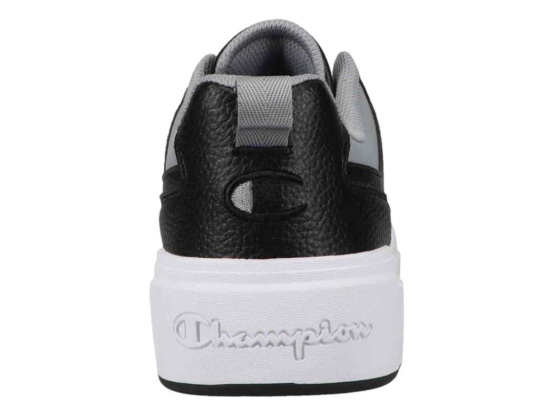 Tenis Champion Drome Ventor Lo color negro con detalles en gris y suela blanca gruesa.