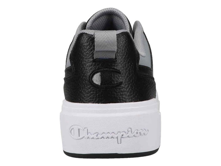 Tenis Champion Drome Ventor Lo color negro con detalles en gris y suela blanca gruesa.
