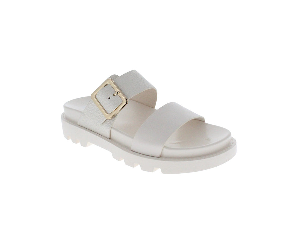 Sandalia beige de plataforma con suela track y hebilla dorada.