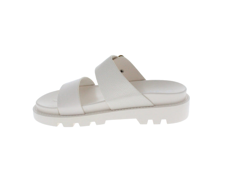 Sandalia beige de plataforma con suela track y hebilla dorada.
