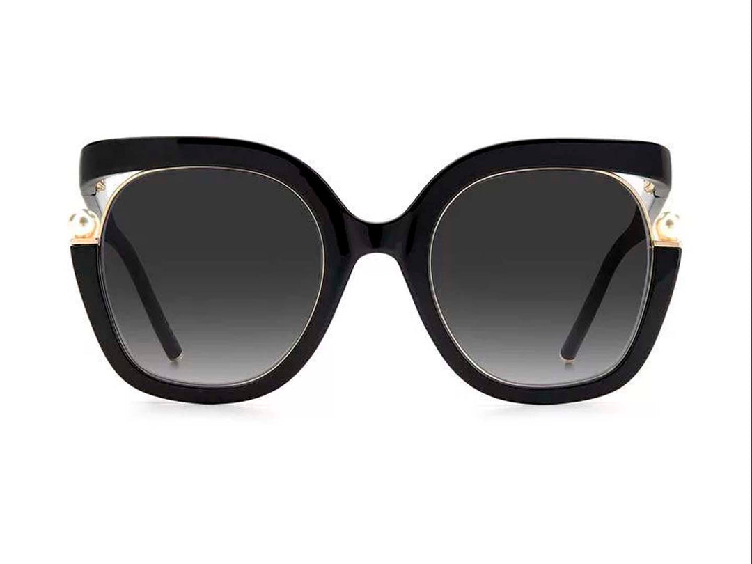 Lentes de sol Carolina Herrera negros con montura ancha, cristales degradados y detalles laterales en dorado.