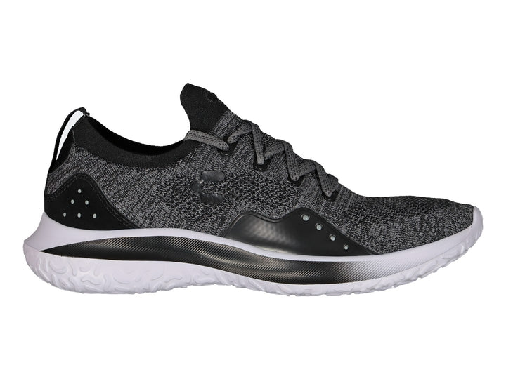 Tenis deportivos Charly color negro con tejido transpirable y suela blanca.