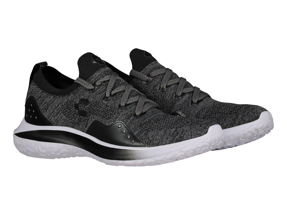 Tenis deportivos Charly color negro con tejido transpirable y suela blanca.