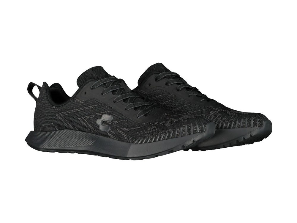 Tenis deportivos Charly color negro con diseño de malla y suela gruesa.