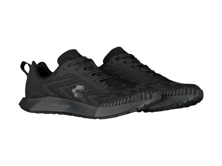 Tenis deportivos Charly color negro con diseño de malla y suela gruesa.
