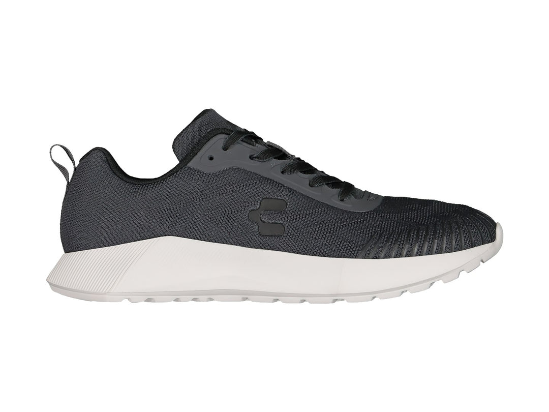 Tenis deportivos Charly color gris oxford con suela blanca y tejido de malla.