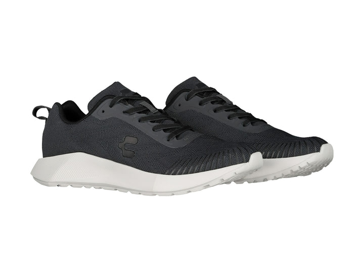Tenis deportivos Charly color gris oxford con suela blanca y tejido de malla.