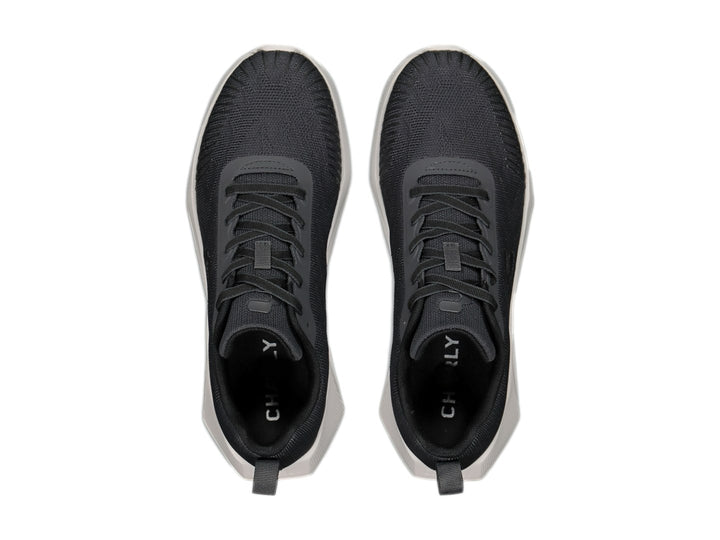 Tenis deportivos Charly color gris oxford con suela blanca y tejido de malla.