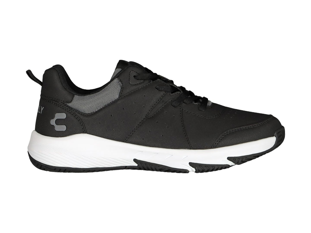 Tenis deportivos Charly color negro con suela blanca.