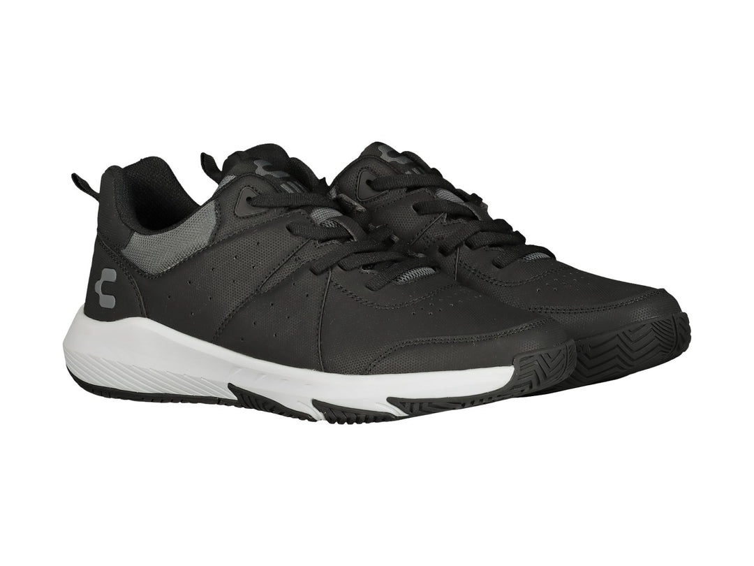 Tenis deportivos Charly color negro con suela blanca.