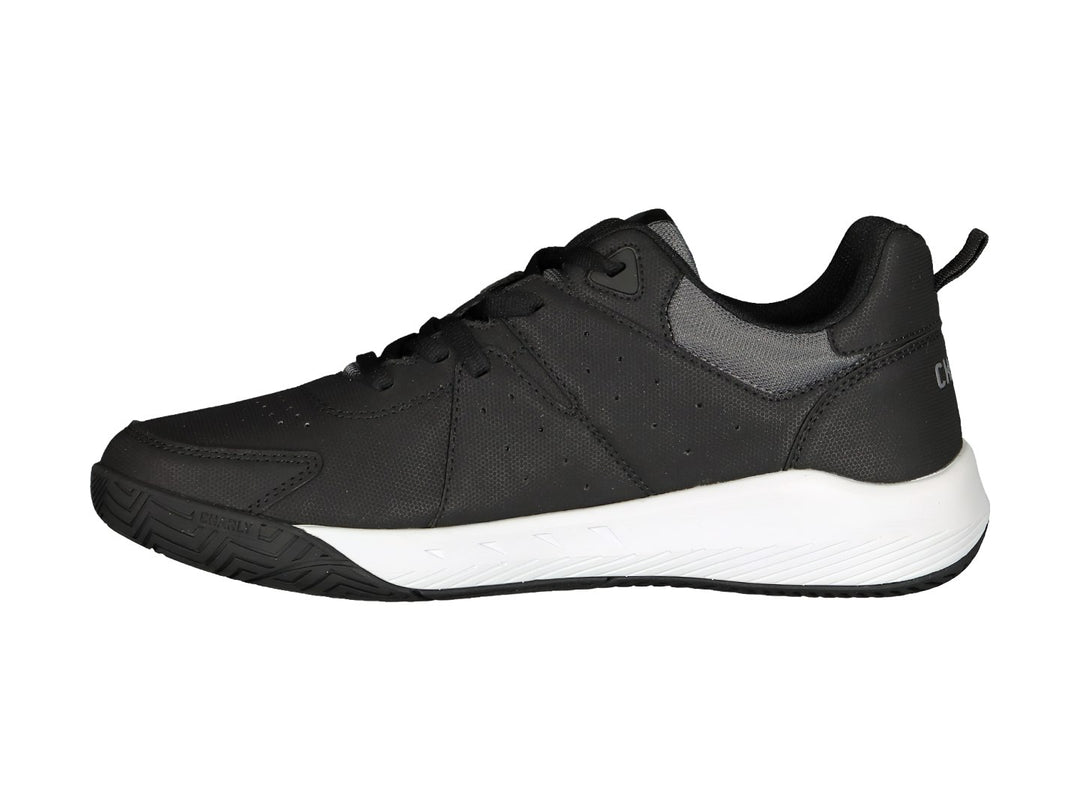 Tenis deportivos Charly color negro con suela blanca.