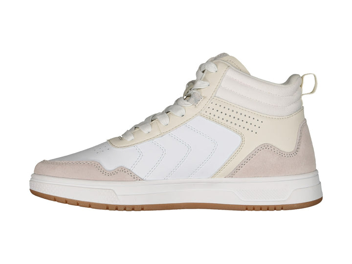 Tenis deportivos Charly color blanco y beige con suela color caramelo.