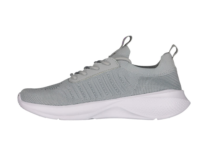 Tenis deportivos Charly color gris con detalles en lila y suela blanca.