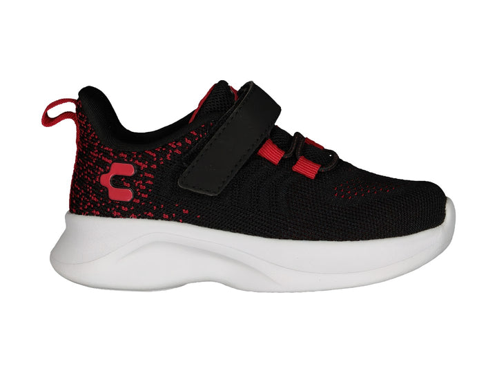 Tenis deportivos Charly color negro con detalles en rojo y suela blanca, cierre de velcro.