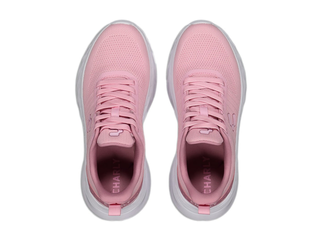 Tenis deportivos Charly de color rosa con suela blanca y tejido de malla.