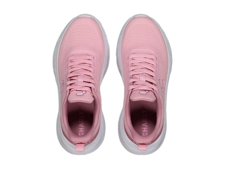Tenis deportivos Charly de color rosa con suela blanca y tejido de malla.