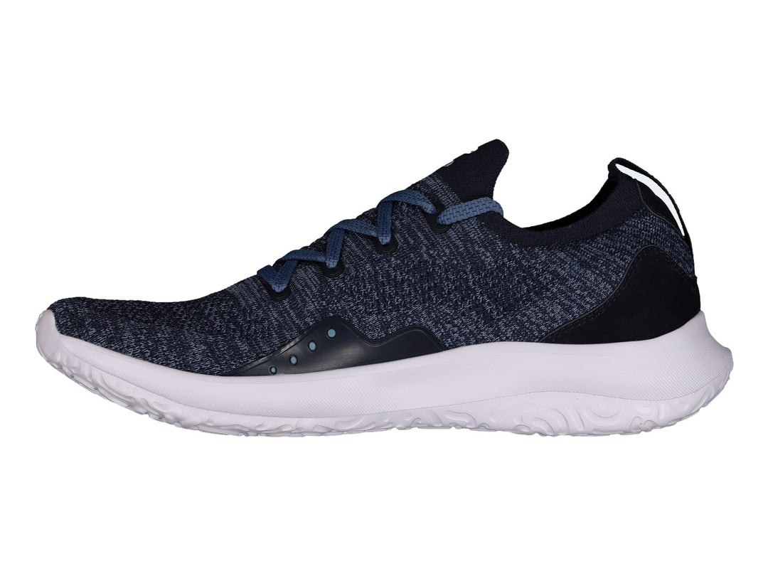 Tenis deportivos Charly color marino con suela blanca y tejido transpirable.