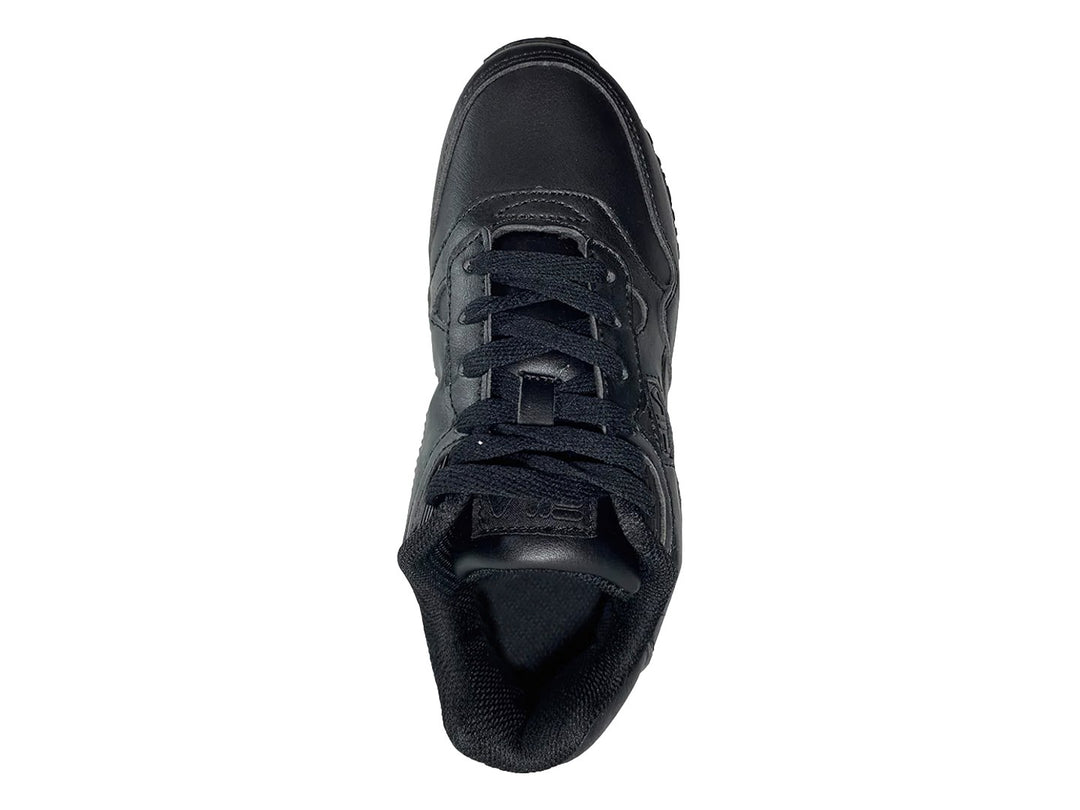 Tenis deportivos FILA modelo 5KM en color negro total con suela texturizada y acabado mate.