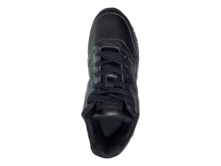 Tenis deportivos FILA modelo 5KM en color negro total con suela texturizada y acabado mate.