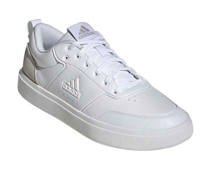 Tenis deportivos Adidas color blanco con detalle gris en el talón y logo blanco en el lateral.