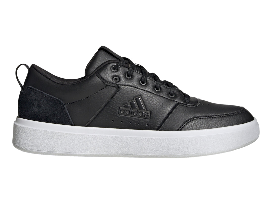 Tenis Adidas Park ST en color negro con suela blanca y logotipo de la marca en el lateral.