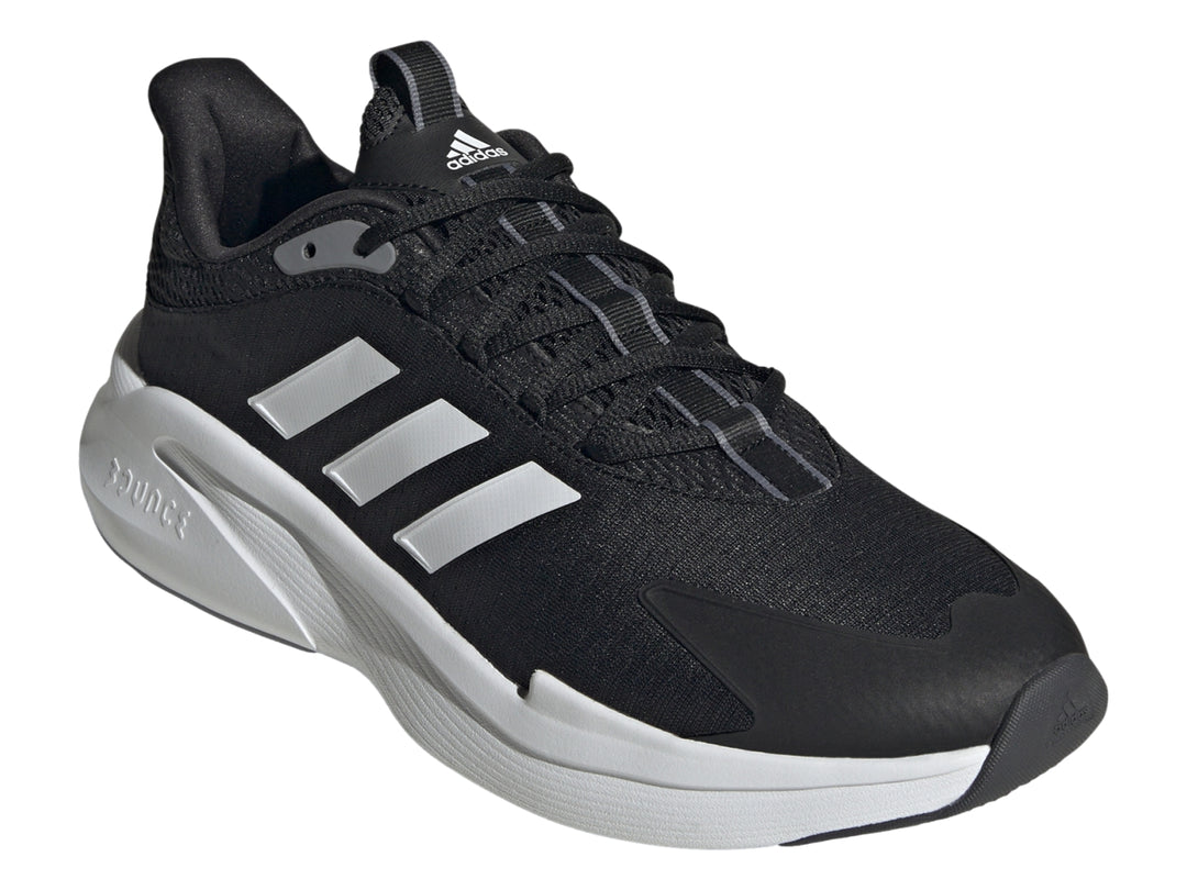 Tenis deportivos Adidas color negro con tres franjas blancas y suela blanca.