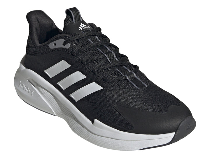 Tenis deportivos Adidas color negro con tres franjas blancas y suela blanca.