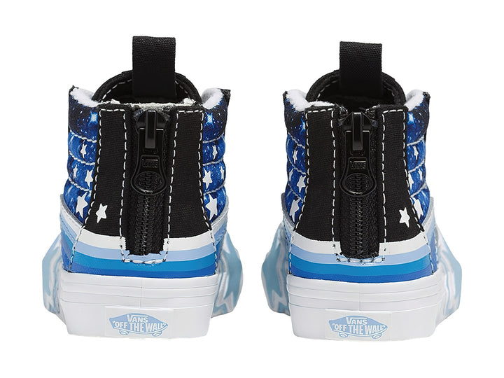 Tenis VANS negros y azules con estampado de estrellas, cierre lateral y suela blanca.