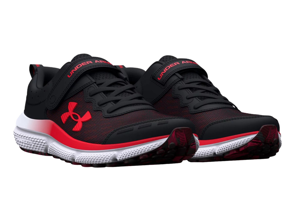 Tenis deportivos Under Armour color negro con logo rojo y suela blanca con degradado rojo.