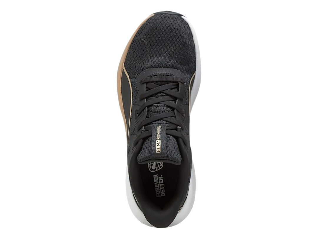 Tenis deportivos PUMA color negro con suela blanca y detalles en dorado.
