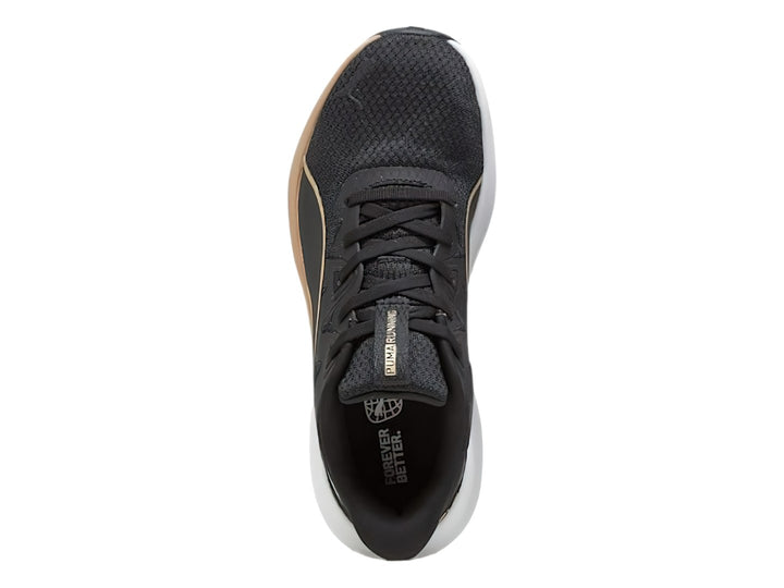Tenis deportivos PUMA color negro con suela blanca y detalles en dorado.