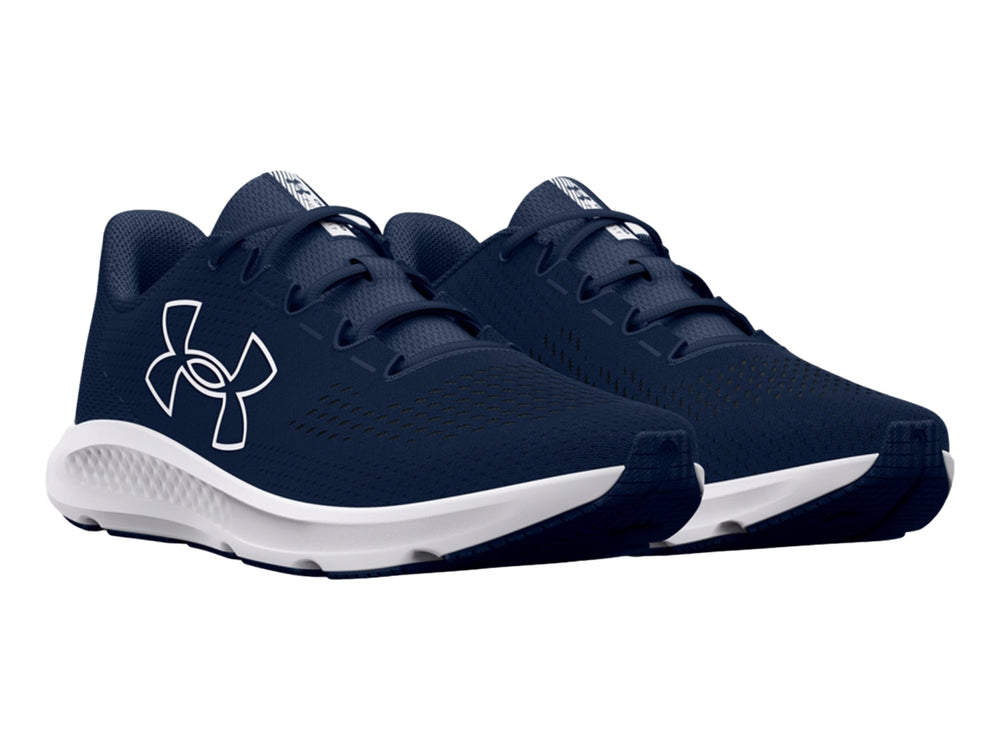 Tenis deportivos Under Armour color azul marino con suela blanca y logotipo blanco lateral.
