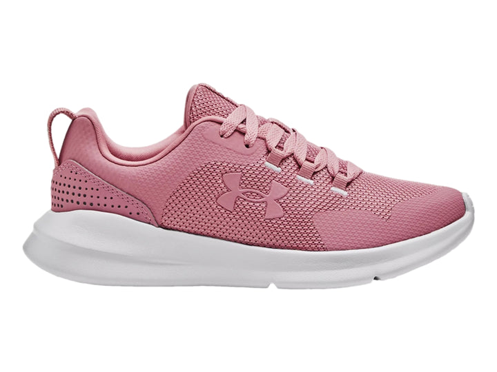 Tenis deportivos Under Armour color rosa con suela blanca.