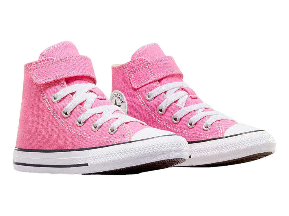 Tenis Converse Chuck Taylor All Star de color rosa para niño o niña, con cierre de velcro y agujetas blancas.