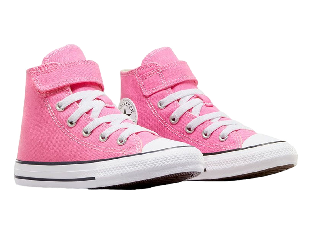 Tenis Converse Chuck Taylor All Star de color rosa para niño o niña, con cierre de velcro y agujetas blancas.