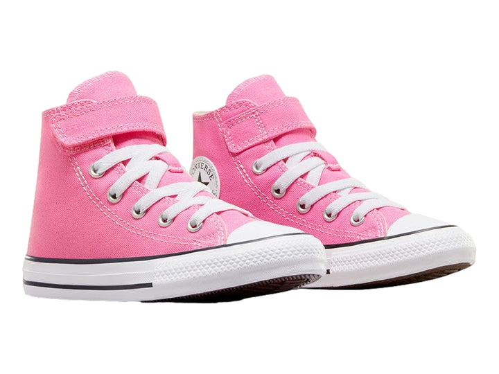 Tenis Converse Chuck Taylor All Star de color rosa para niño o niña, con cierre de velcro y agujetas blancas.