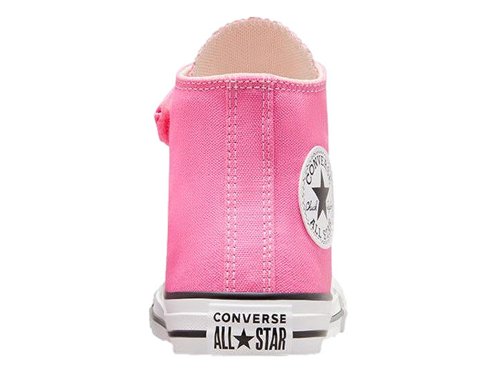 Tenis Converse Chuck Taylor All Star de color rosa para niño o niña, con cierre de velcro y agujetas blancas.