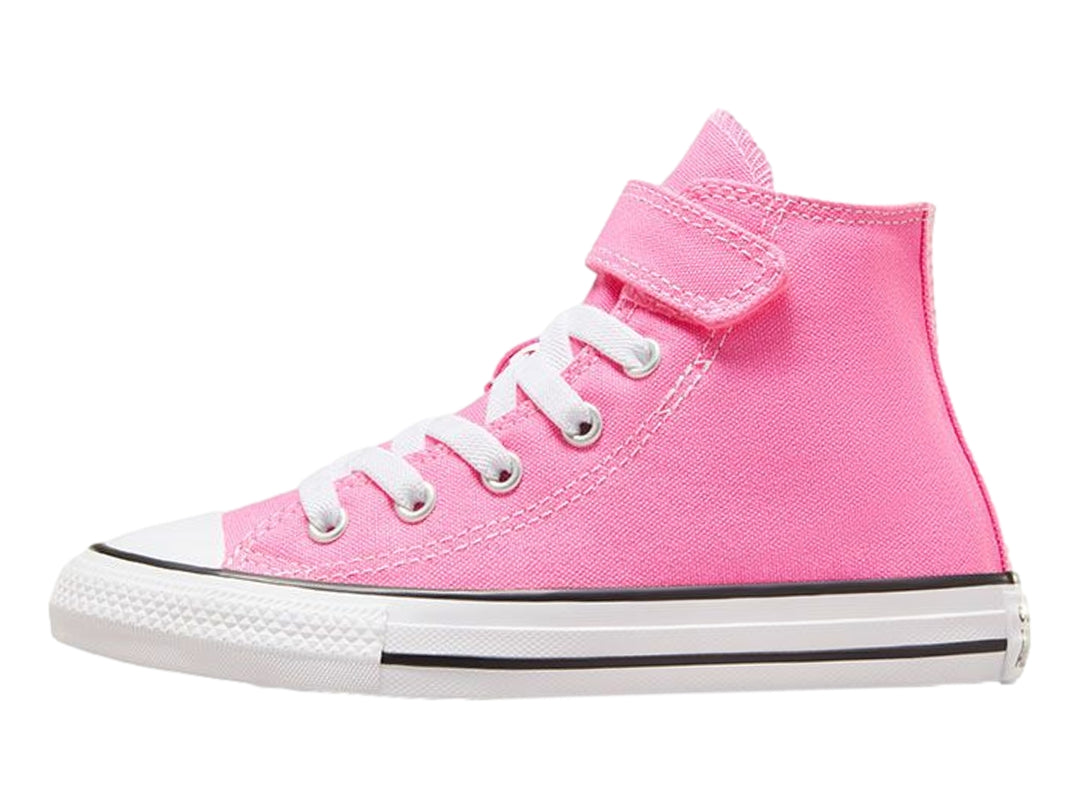 Tenis Converse Chuck Taylor All Star de color rosa para niño o niña, con cierre de velcro y agujetas blancas.