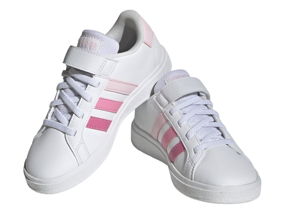 Tenis blancos Adidas Grand Court 2.0 EL K con tres franjas rosas y cierre de velcro.
