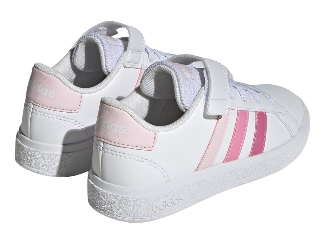 Tenis blancos Adidas Grand Court 2.0 EL K con tres franjas rosas y cierre de velcro.