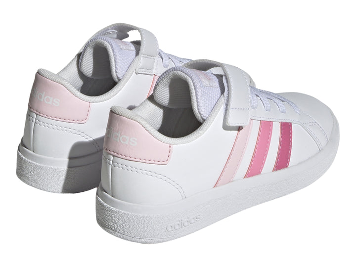 Tenis blancos Adidas Grand Court 2.0 EL K con tres franjas rosas y cierre de velcro.