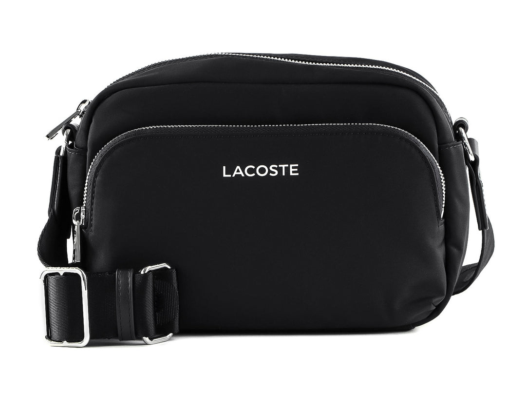 Bolso bandolera Lacoste color negro con cierres plateados y correa ajustable.