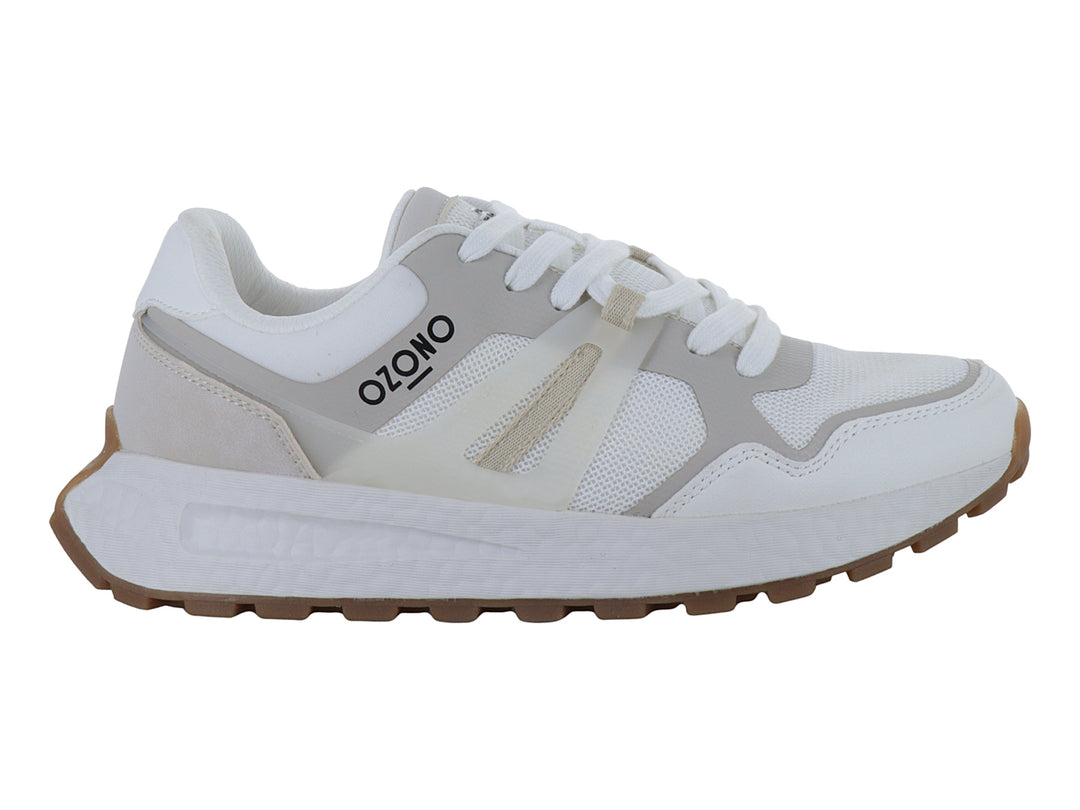 Tenis blancos Capa de Ozono con detalles en beige y suela marrón dentada.
